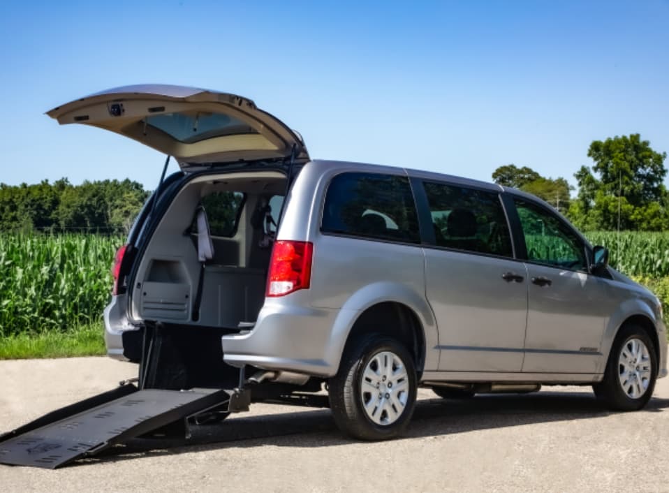 Minivan with a rear wheelchair ramp deployed